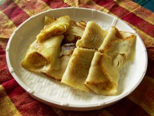 Paatishapta (stuffed pancakes)        